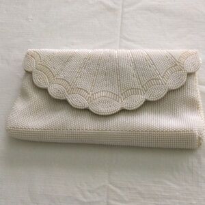 Woman’s Scallop Beaded Clutch Purse Size 10” x 6” color Ivory snap to close.